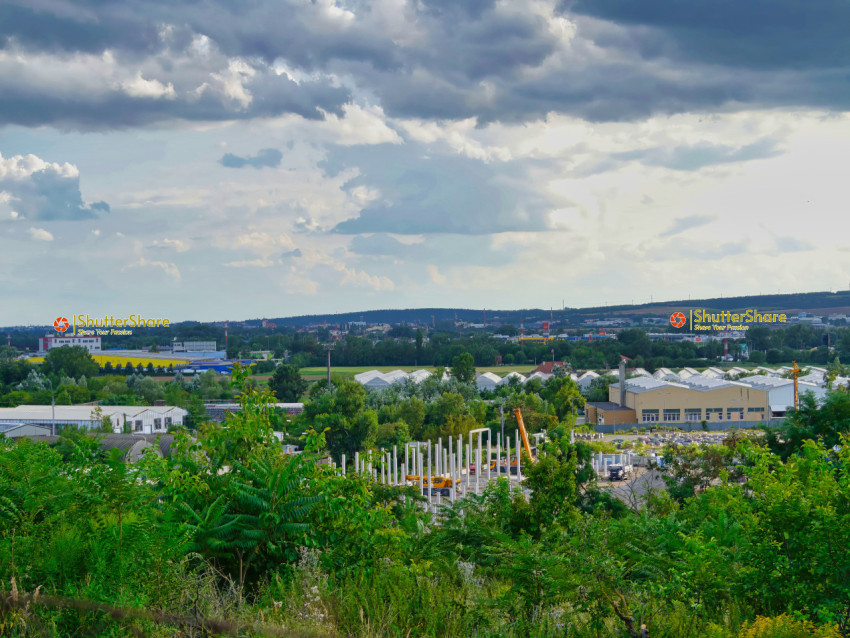 Industrial Landscape with Dramatic Sky